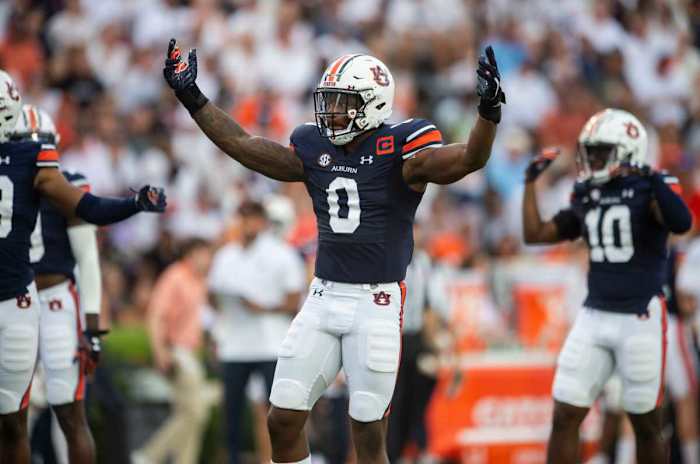 Auburn Tigers linebacker Owen Pappoe (0) pumps up the crowd as Auburn Tigers take on Mercer Bears at Jordan-Hare Stadium in Auburn, Ala., on Saturday, Sept. 3, 2022.
